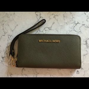 BRAND NEW Michael Kors wristlet wallet NWOT. Elegant rich olive green.